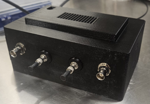 Front view of a detector unit showing the OLED display and controls.